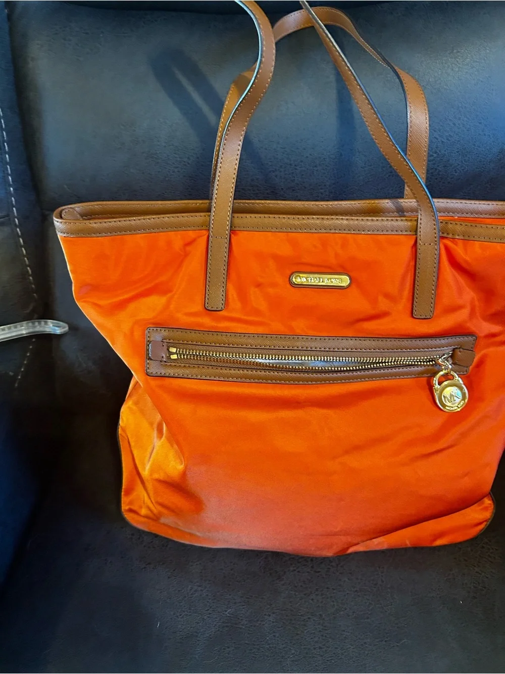Michael Kors Vibrant Orange Tote with Brown Trim and Gold Hardware